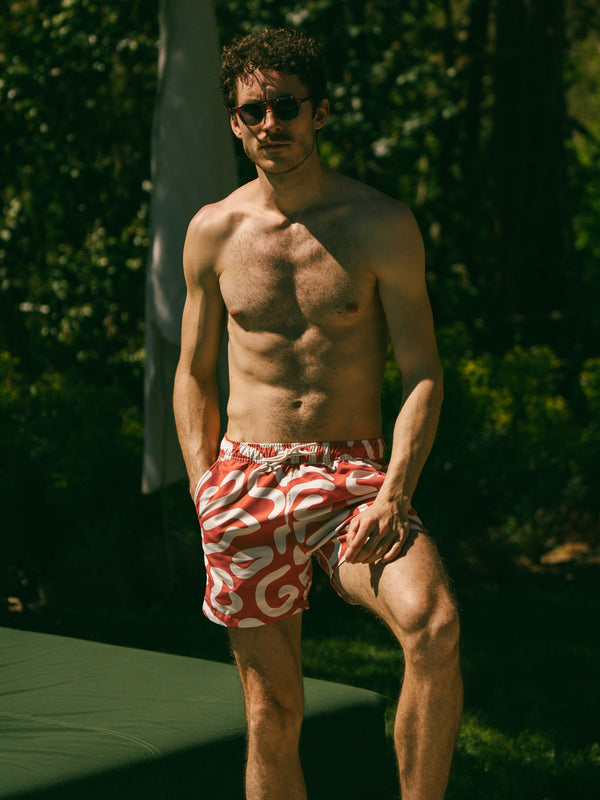Pétrone short bain polyester recyclé graphique rouille homme